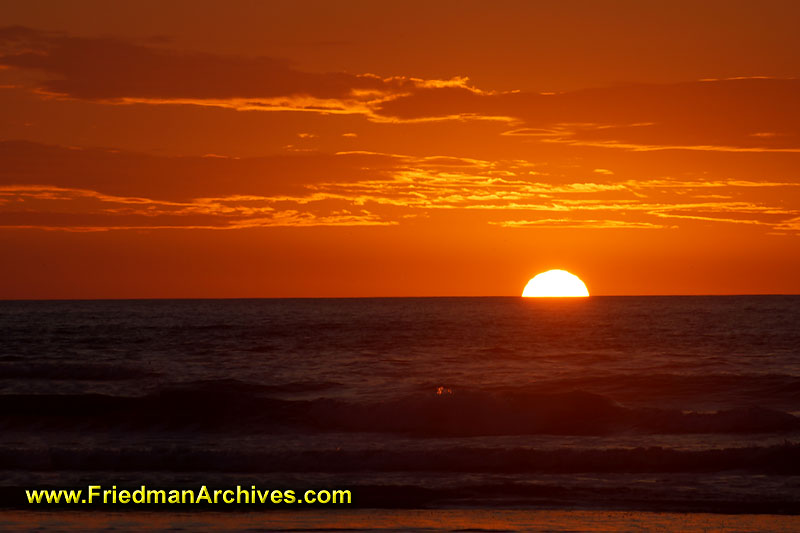 ocean,sunset,orange,water,beach,sun,clouds,